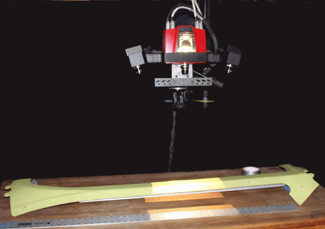 Window trim assembly being scanned with GOM/ATOS 3D scanner. Window trim assembly being scanned with GOM/ATOS 3D scanner.